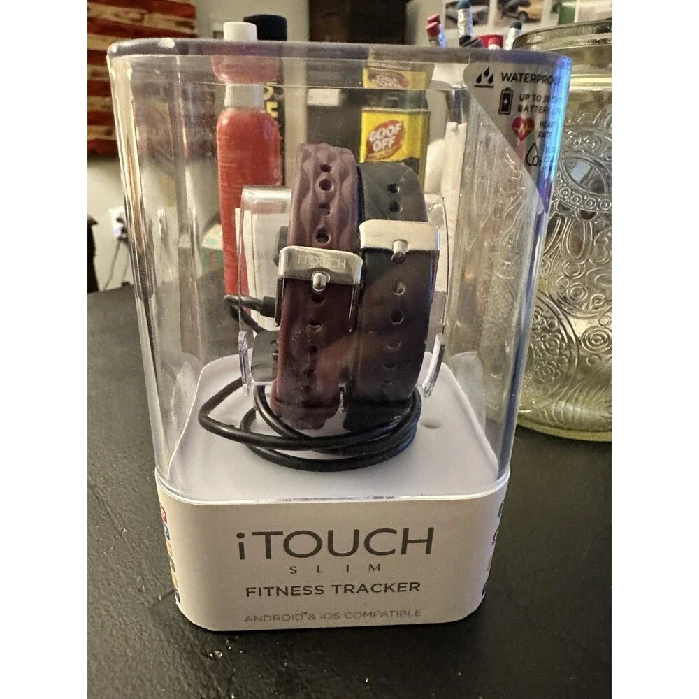 Two itouch slim fitness trackers and 2 chargers (not tested)